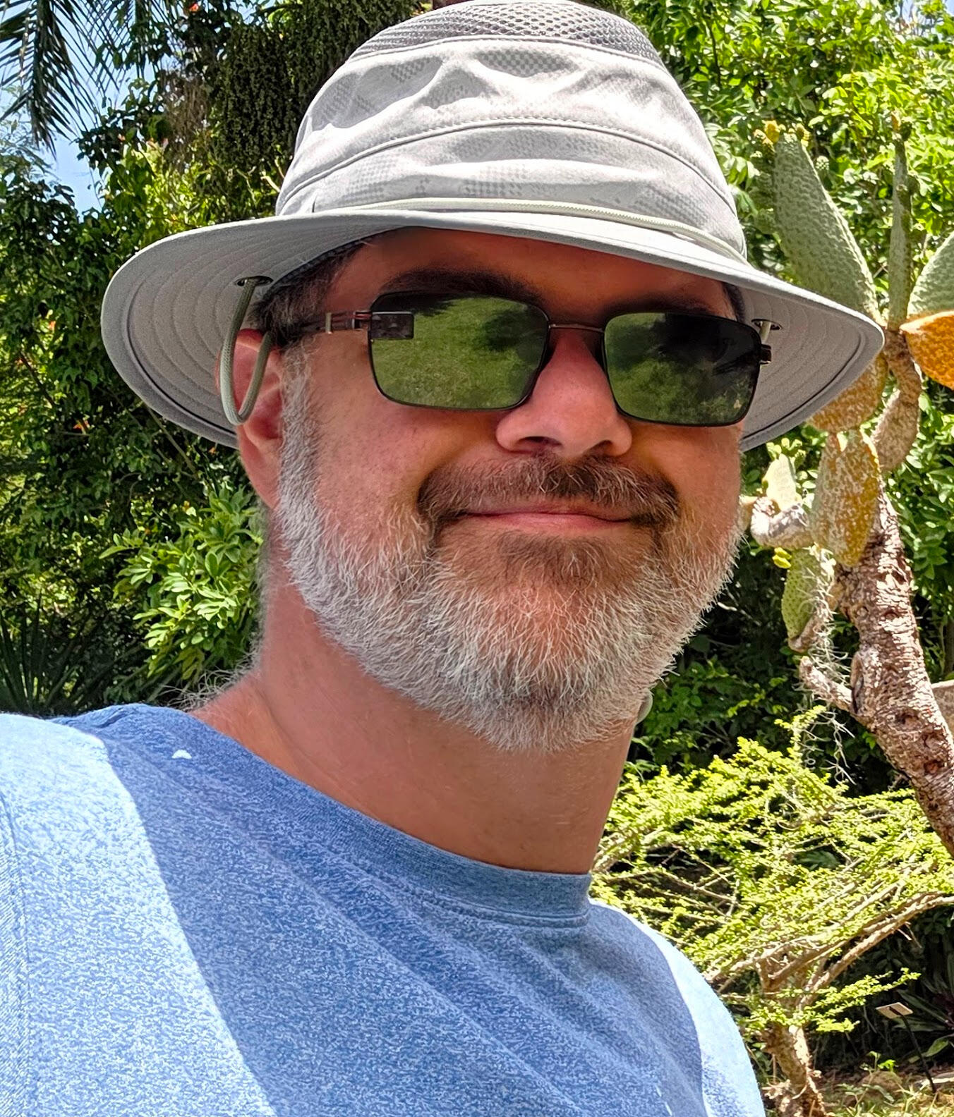 Vacation Mode! Wes in a hat and sunglasses